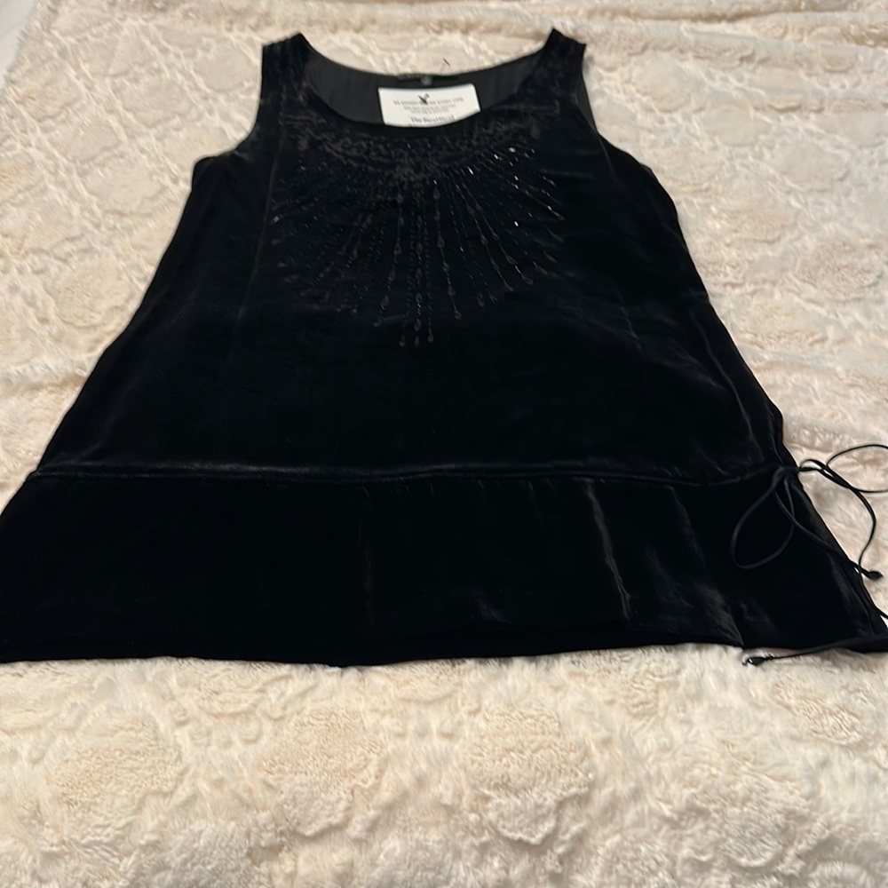 Velvet mini dress with laser cutouts and beading